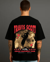 Back view of man wearing ATRAYE black streetwear T-shirt with bold tour print design.