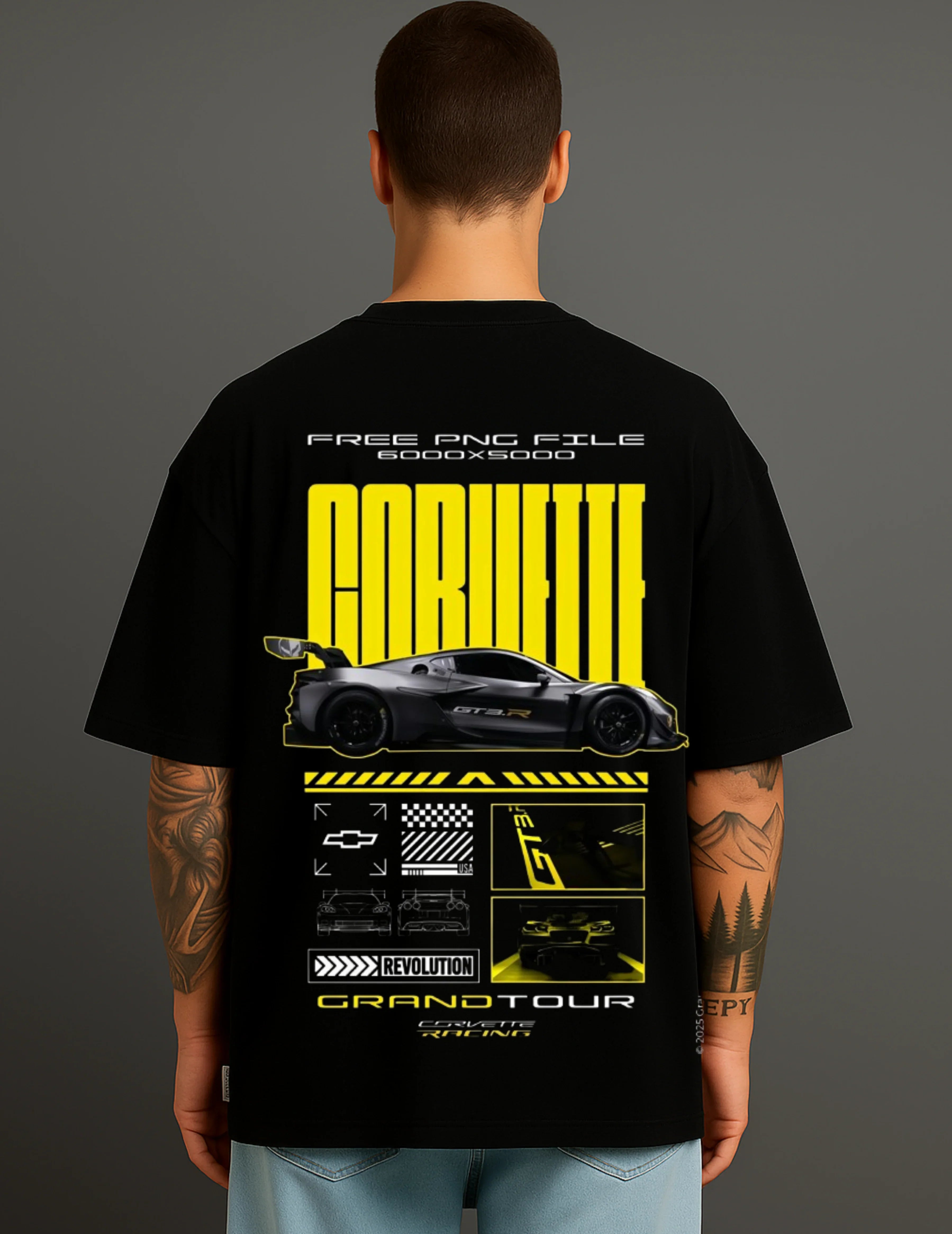 Man wearing black ATRAYE streetwear T-shirt with bold Corvette racing car graphic on back