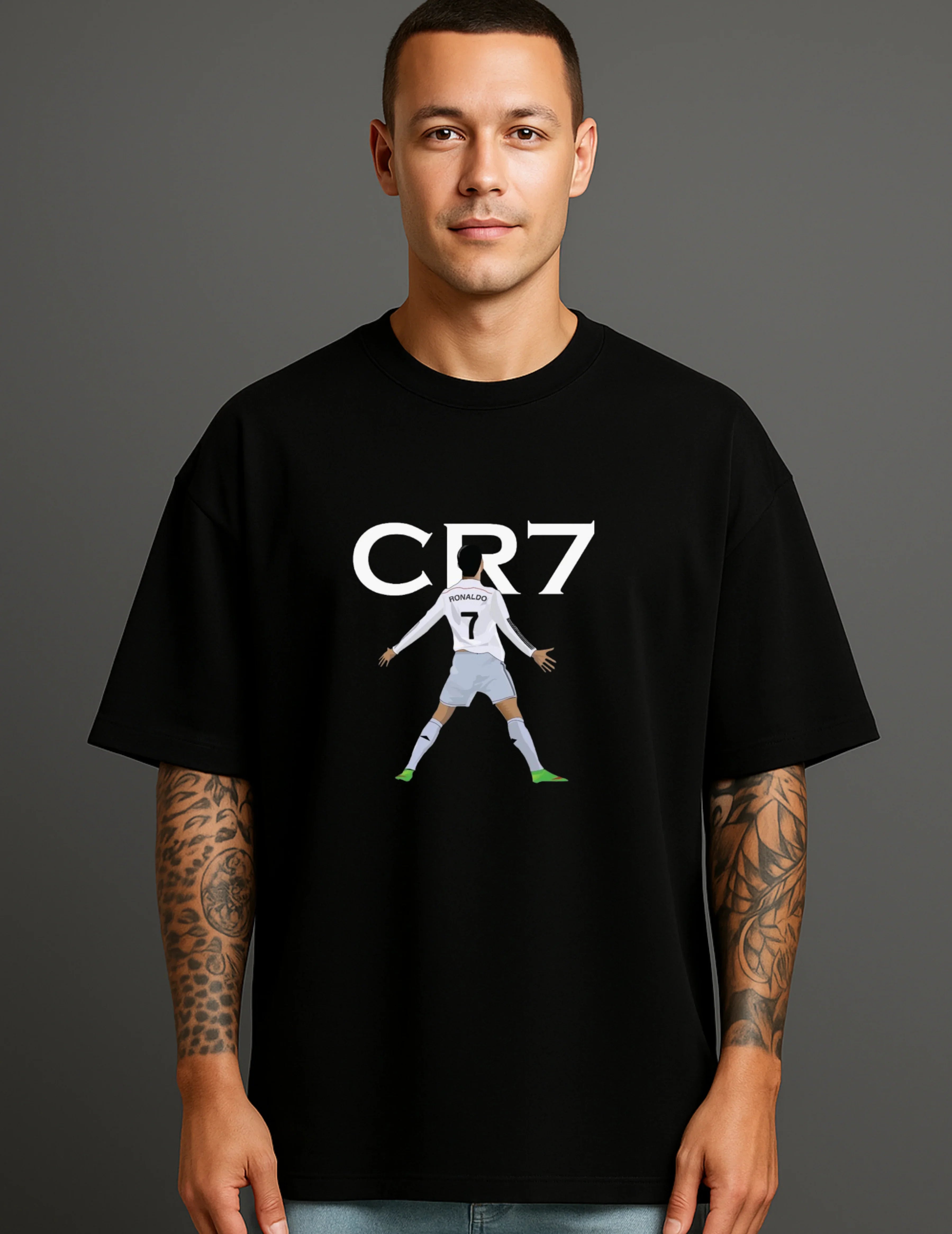Man wearing black ATRAYE streetwear T-shirt with CR7 graphic and soccer player print