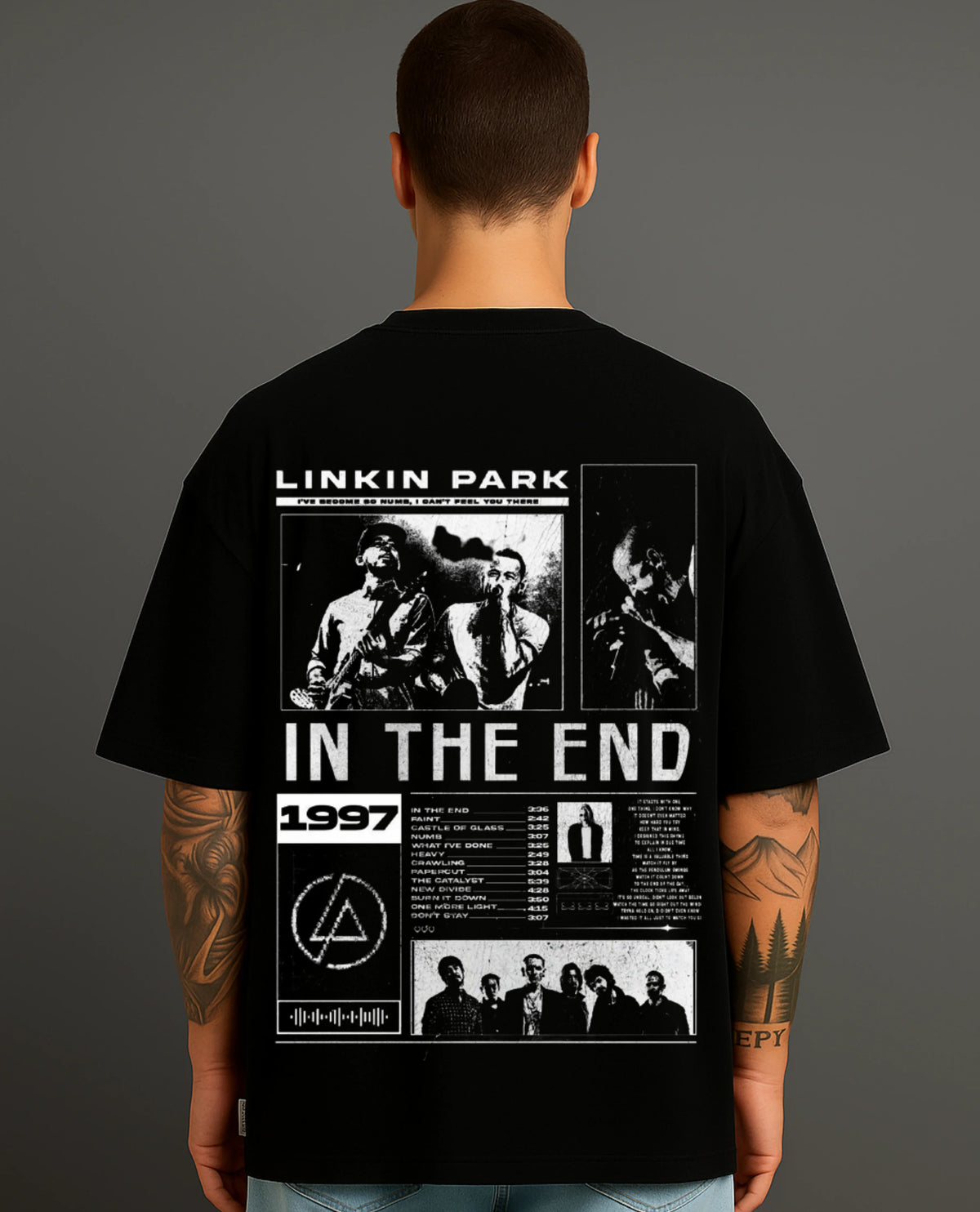 Man wearing black streetwear T-shirt with bold Linkin Park graphic and text tribute design