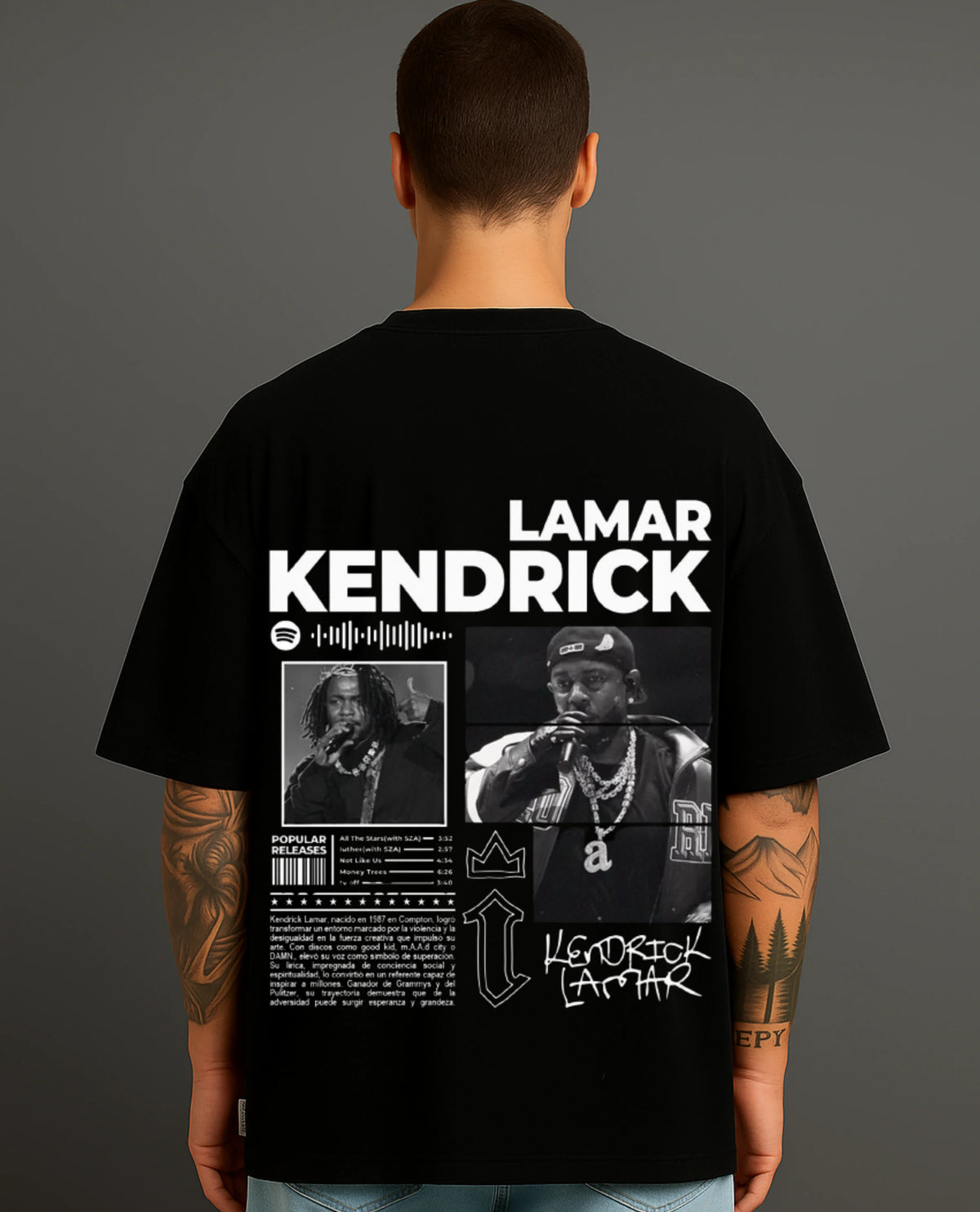 Man wearing black ATRAYE streetwear T-shirt with bold 'Lamar Kendrick' graphic and artist photos.