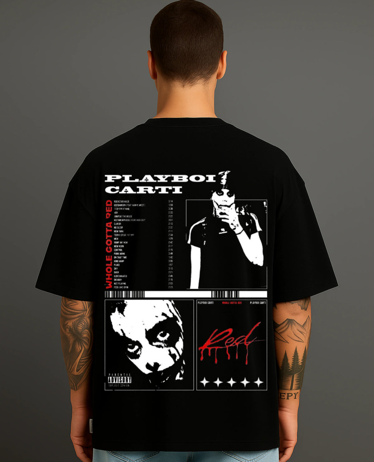 Man wearing black streetwear T-shirt with bold Playboi Carti graphic print on back