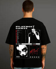 Man wearing black streetwear T-shirt with bold Playboi Carti graphic print on back