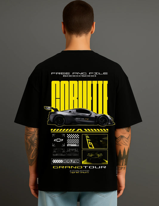 Man wearing black ATRAYE streetwear T-shirt with bold Corvette racing car graphic on back