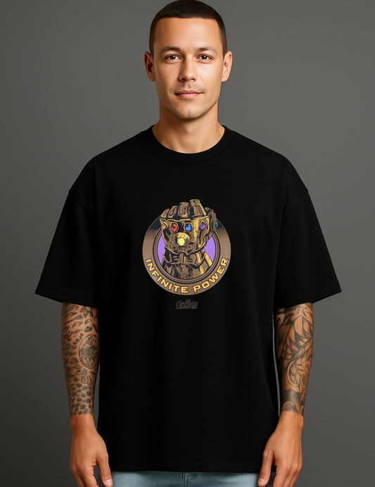 Man wearing black ATRAYE streetwear T-shirt with bold printed 'Infinite Power' graphic