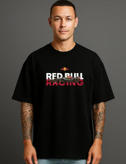Man in black oversized streetwear T-shirt with Red Bull Racing car graphic, ATRAYE style