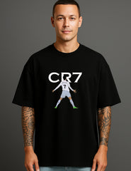 Man wearing black ATRAYE streetwear T-shirt with CR7 graphic and soccer player print